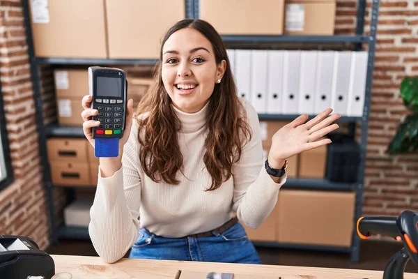 Young Hispanic Woman Working Small Business Ecommerce Holding Dataphone Celebrating — Stock Fotó