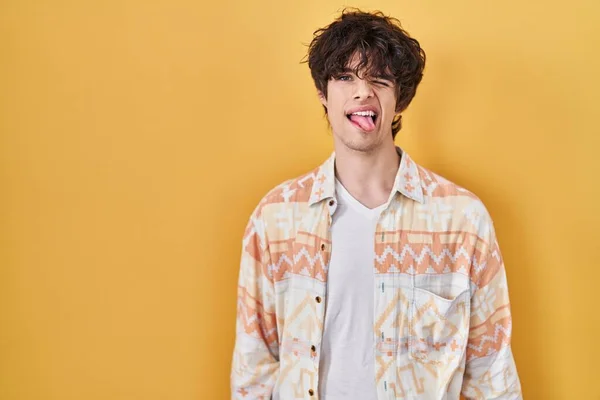 Young Man Wearing Casual Summer Shirt Sticking Tongue Out Happy —  Fotos de Stock