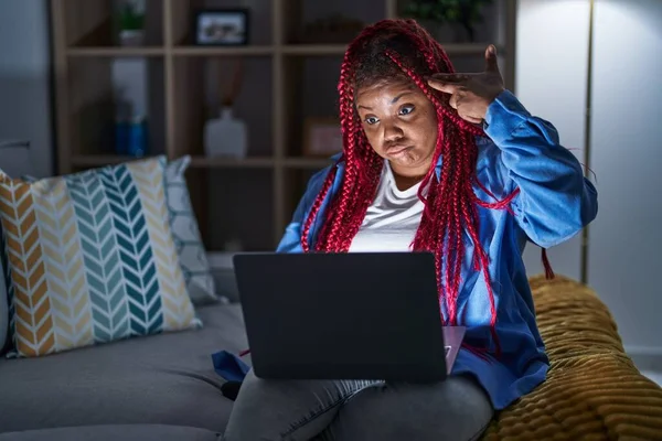African American Woman Braided Hair Using Computer Laptop Night Shooting —  Fotos de Stock