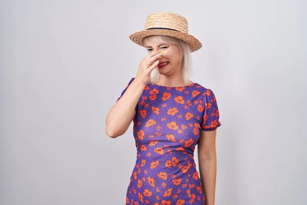Young Caucasian Woman Wearing Flowers Dress Summer Hat Smelling Something — Stockfoto