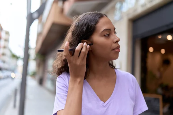 Young African American Woman Listening Audio Message Smartphone Serious Expression — Stockfoto