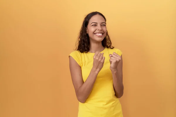 Young African American Woman Standing Winner Expression Isolated Yellow Background — Stockfoto