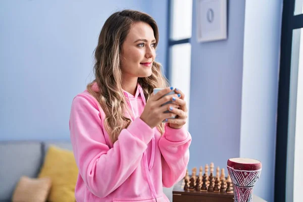 Young Woman Drinking Coffee Standing Home — Fotografia de Stock