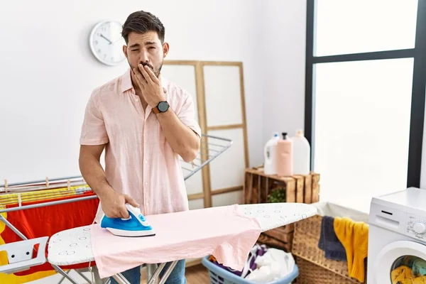 Young Man Beard Ironing Clothes Home Bored Yawning Tired Covering — Stockfoto