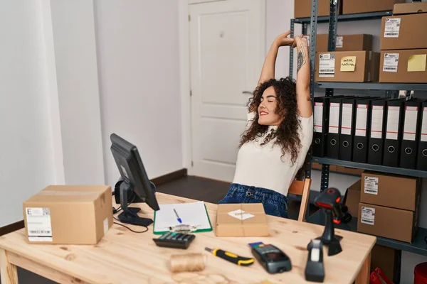 Young Beautiful Hispanic Woman Ecommerce Business Worker Stretching Arms Office —  Fotos de Stock