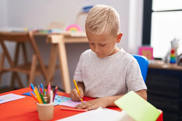 Adorable Toddler Student Drawing Notebook Sitting Table Classroom — Stockfoto