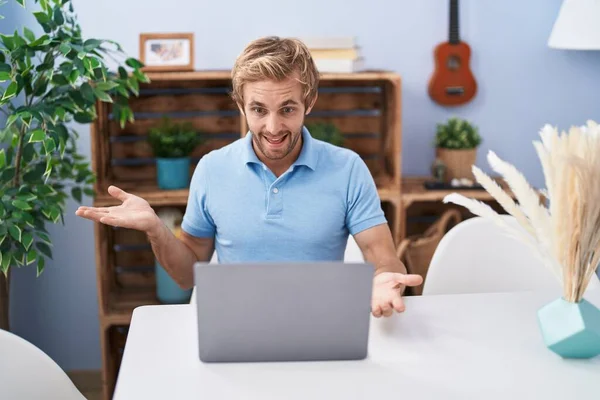 Caucasian Man Using Laptop Doing Video Call Celebrating Achievement Happy —  Fotos de Stock