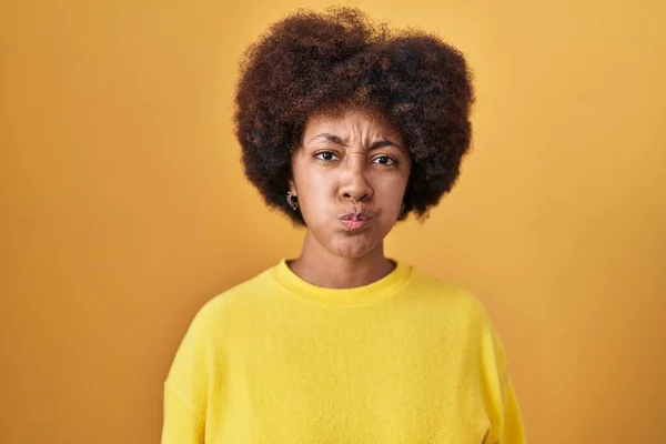 Young African American Woman Standing Yellow Background Puffing Cheeks Funny — Foto de Stock