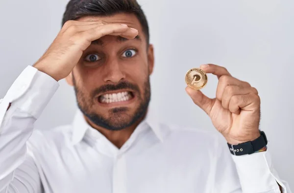 Handsome Hispanic Man Holding Polkadot Cryptocurrency Coin Stressed Frustrated Hand — Stock Photo, Image