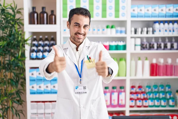 Handsome Hispanic Man Working Pharmacy Drugstore Success Sign Doing Positive — Zdjęcie stockowe