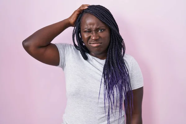 Young African Woman Standing Pink Background Confuse Wondering Question Uncertain — Photo