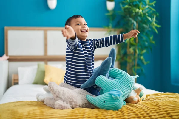 Adorable Hispanic Toddler Smiling Confident Sitting Bed Bedroom — Stockfoto