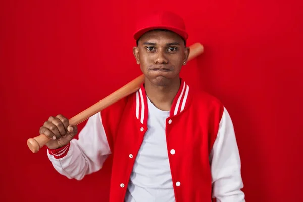 Young Hispanic Man Playing Baseball Holding Bat Puffing Cheeks Funny — Stock Photo, Image