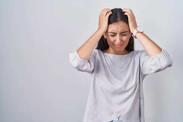 Young Hispanic Woman Standing White Background Suffering Headache Desperate Stressed — Foto de Stock