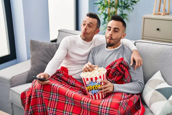 Homosexual Couple Eating Popcorn Watching Making Fish Face Mouth Squinting — Stok fotoğraf