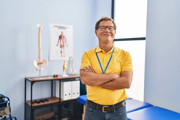 Middle Age Man Physiotherapist Smiling Confident Standing Arms Crossed Gesture — ストック写真
