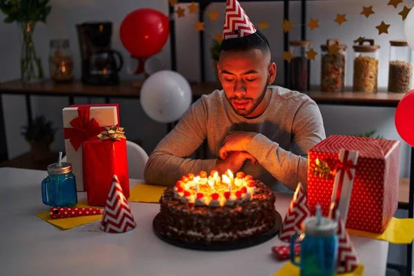 African American Man Blowing Out Candles Celebrating Birthday Home — Stock Photo, Image