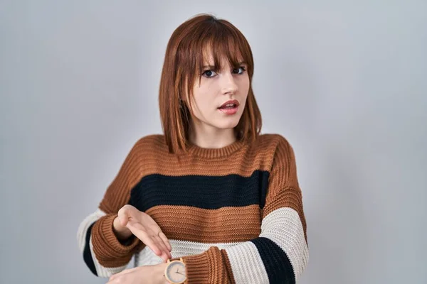 Young Beautiful Woman Wearing Striped Sweater Isolated Background Hurry Pointing — 스톡 사진