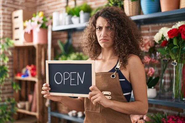 Hispanic Woman Curly Hair Working Florist Holding Open Sign Clueless — Foto Stock