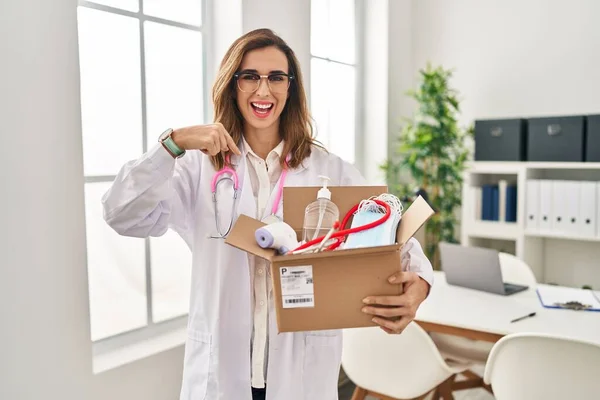 Young Doctor Woman Holding Box Medical Items Pointing Finger One — Foto Stock