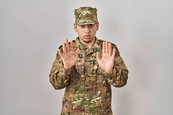 Young Arab Man Wearing Camouflage Army Uniform Moving Away Hands — Stock Photo, Image