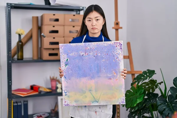 Chinese Young Woman Holding Canvas Art Studio Depressed Worry Distress — Stockfoto