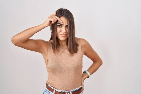 Young Hispanic Woman Standing White Background Pointing Unhappy Pimple Forehead — Stock Photo, Image
