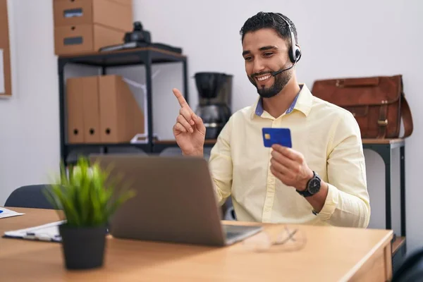 Hispanic Young Man Wearing Call Center Agent Headset Doing Online — Stockfoto