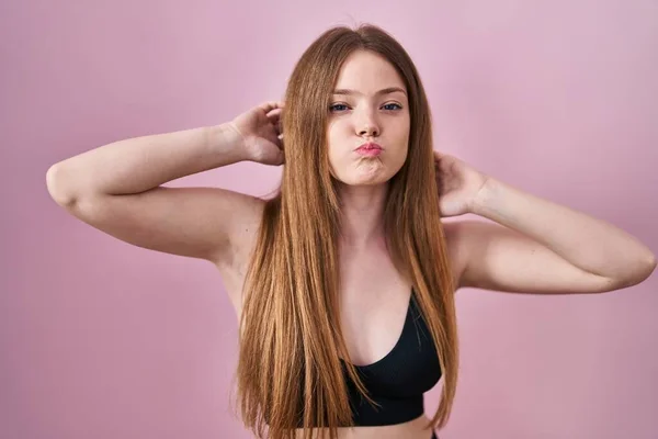 Young Caucasian Woman Wearing Lingerie Pink Background Puffing Cheeks Funny —  Fotos de Stock