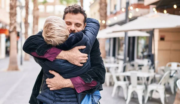 Mother Son Smiling Confident Hugging Each Other Street — Stockfoto