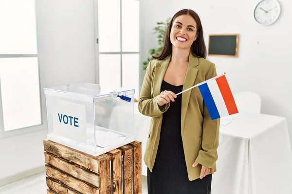 Young Beautiful Hispanic Woman Smiling Confident Holding Netherlands Flag Standing — Fotografia de Stock