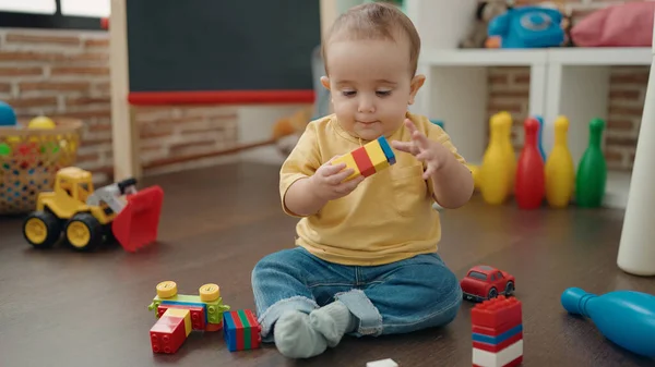 Adorable Hispanic Baby Playing Construction Blocks Sitting Floor Kindergarten — 图库照片