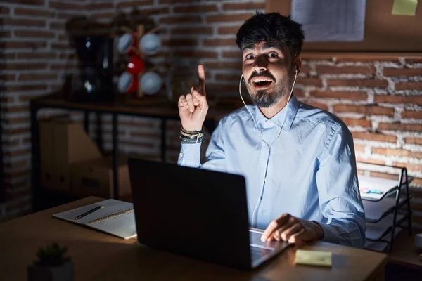 Young Hispanic Man Beard Working Office Night Pointing Finger Successful — Photo