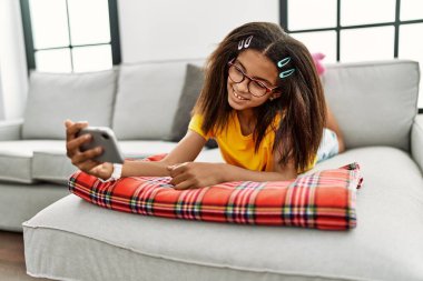 African american girl smiling confident make selfie by the smartphone at home