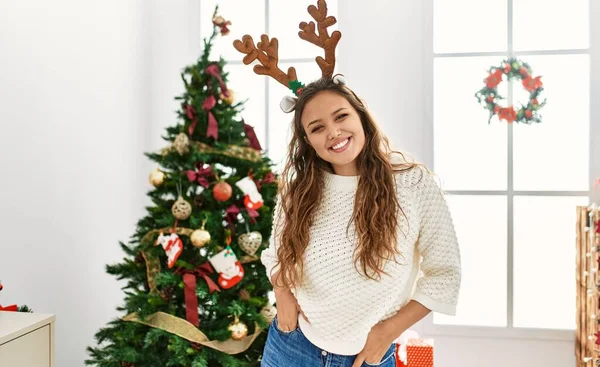 Young Beautiful Hispanic Woman Wearing Reindeer Ears Standing Christmas Tree — Foto de Stock