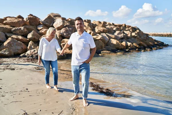 Middle Age Man Woman Couple Smiling Confident Walking Seaside — Stock fotografie