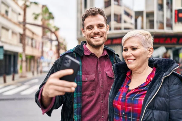 Mother Son Smiling Confident Using Smartphone Street — Foto Stock