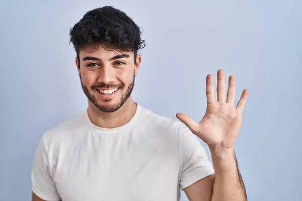 Hispanic Man Beard Standing White Background Showing Pointing Fingers Number — Foto de Stock