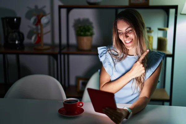 Young Hispanic Woman Using Touchpad Sitting Table Night Cheerful Smile — Stockfoto