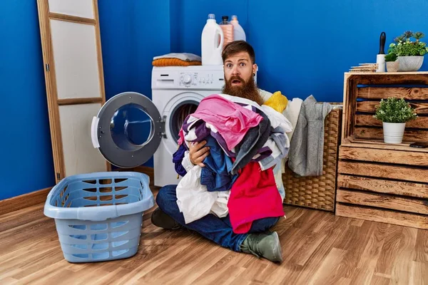 Redhead Man Long Beard Putting Dirty Laundry Washing Machine Clueless — Stockfoto