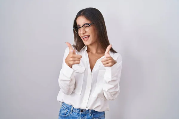 Young Brunette Woman Wearing Glasses Pointing Fingers Camera Happy Funny — Zdjęcie stockowe