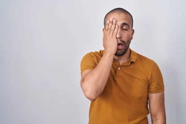 Hispanic Man Beard Standing White Background Yawning Tired Covering Half — Stock fotografie