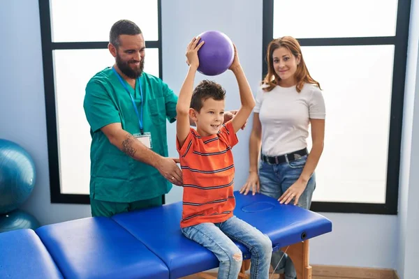 Family Having Rehab Session Using Ball Rehab Clinic — Stok fotoğraf