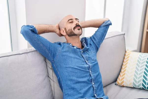 Young Hispanic Man Relaxed Hands Head Sitting Sofa Home — Stock Photo, Image