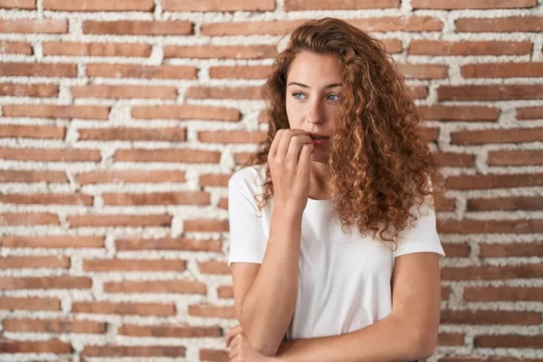 Young Caucasian Woman Standing Bricks Wall Background Looking Stressed Nervous — Foto de Stock