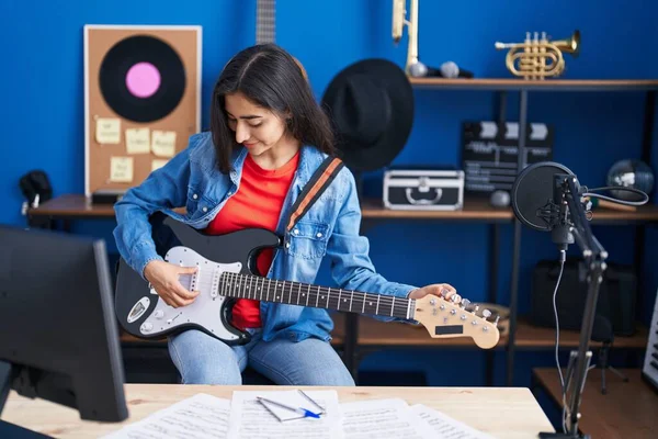 Young Hispanic Girl Artist Playing Electrical Guitar Music Studio — Stock fotografie