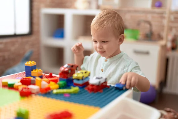 Adorable Toddler Playing Car Toy Construction Blocks Sitting Table Kindergarten — Stock Photo, Image