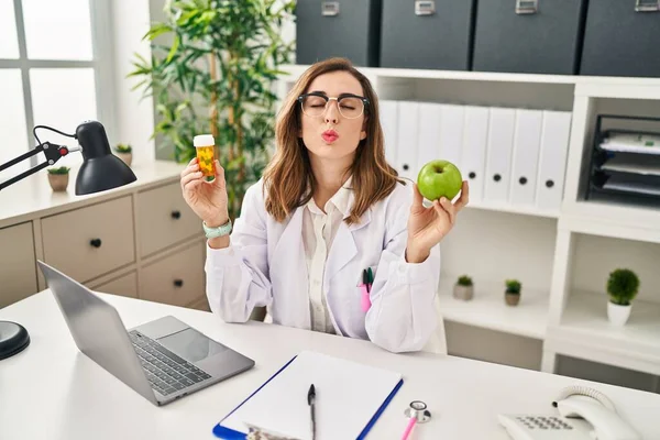Young Woman Working Dietitian Clinic Looking Camera Blowing Kiss Being — Foto Stock