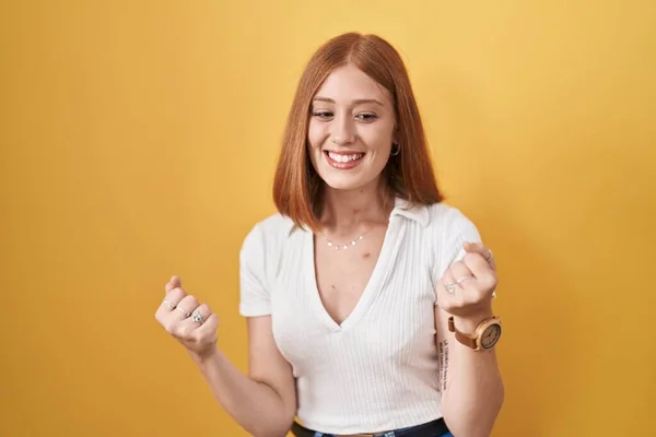 Young Redhead Woman Standing Yellow Background Very Happy Excited Doing — Zdjęcie stockowe