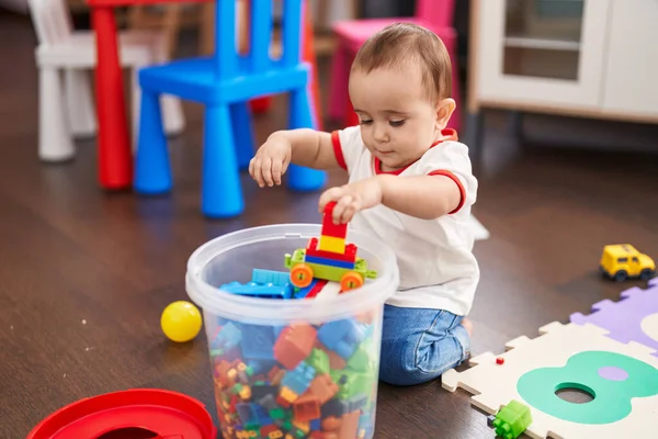 Adorable Hispanic Baby Playing Construction Blocks Sitting Floor Kindergarten — Stockfoto